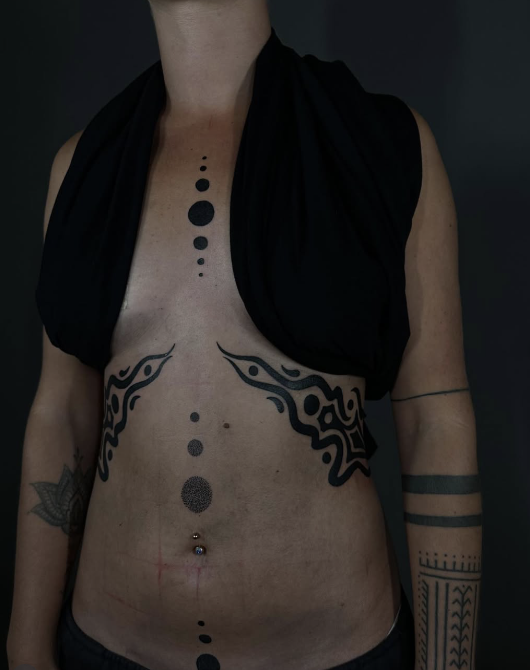 Fluid symmetry — symmetrical flowing abstract tattoo