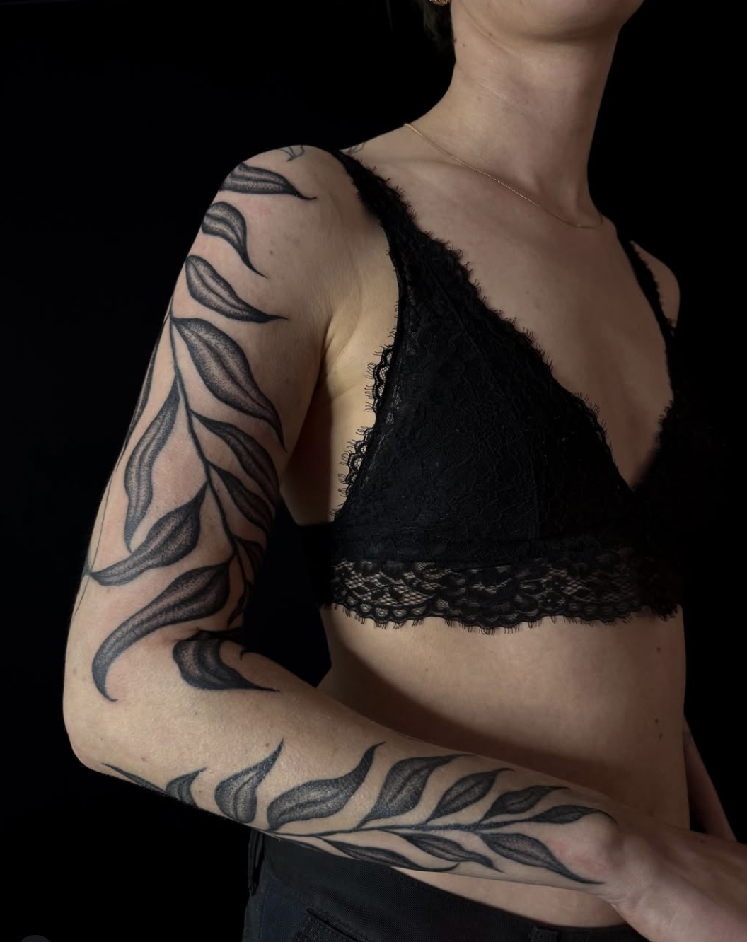 Wrapped nature — tattoo of organic forms wrapping around the limb